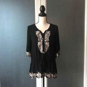 Black tunic with embroidery detail